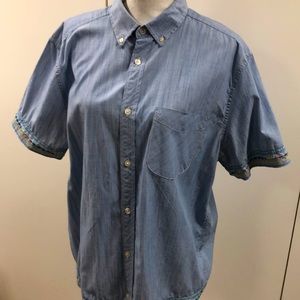 This custom embroidered shirt is one of a kind. It measures 20” across the back